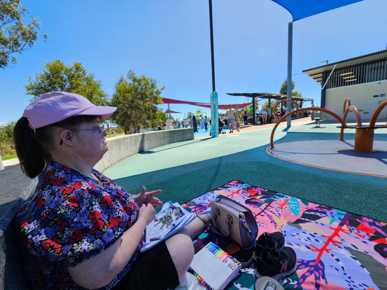 Participant enjoying an accessible community water park outing