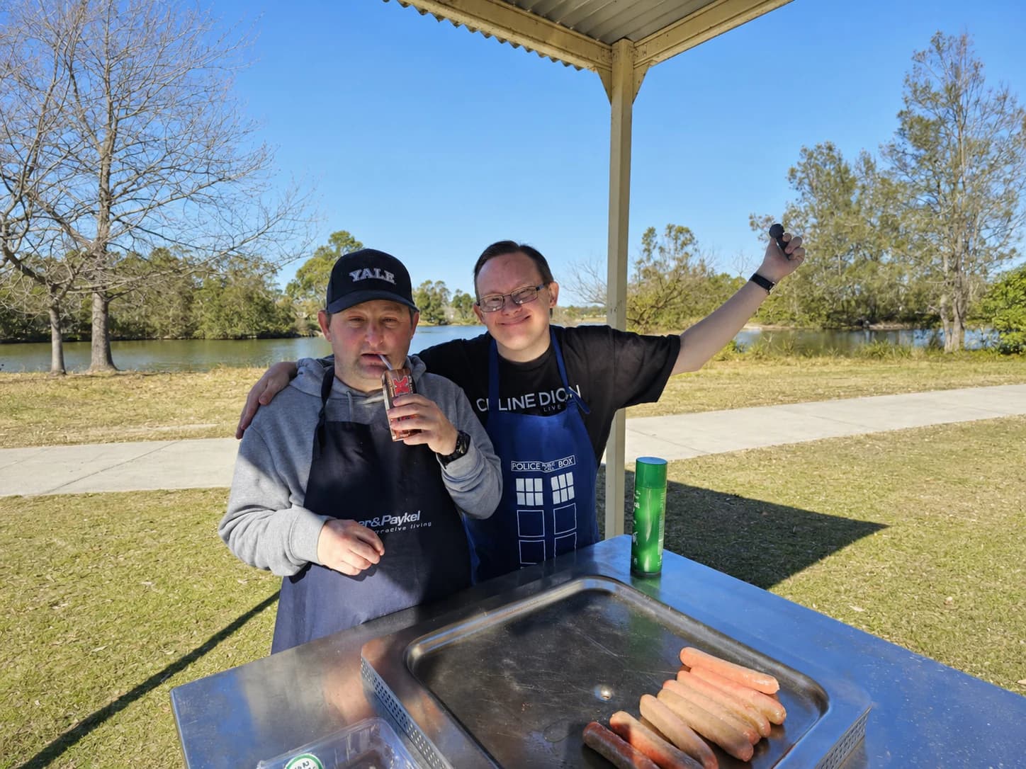 Participants enjoying an outdoor barbecue activity